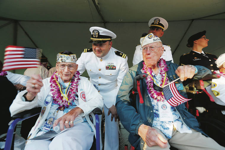 Pearl Harbor survivor Stu Hedley showed his patriotism during the 78th anniversary of the Pearl Harbor ceremony at the USS Arizona Memorial Visitors Center in 2019.